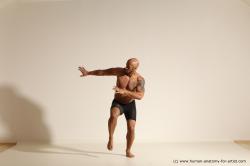 Underwear Gymnastic poses Man Black Muscular Bald Dancing Dynamic poses Academic